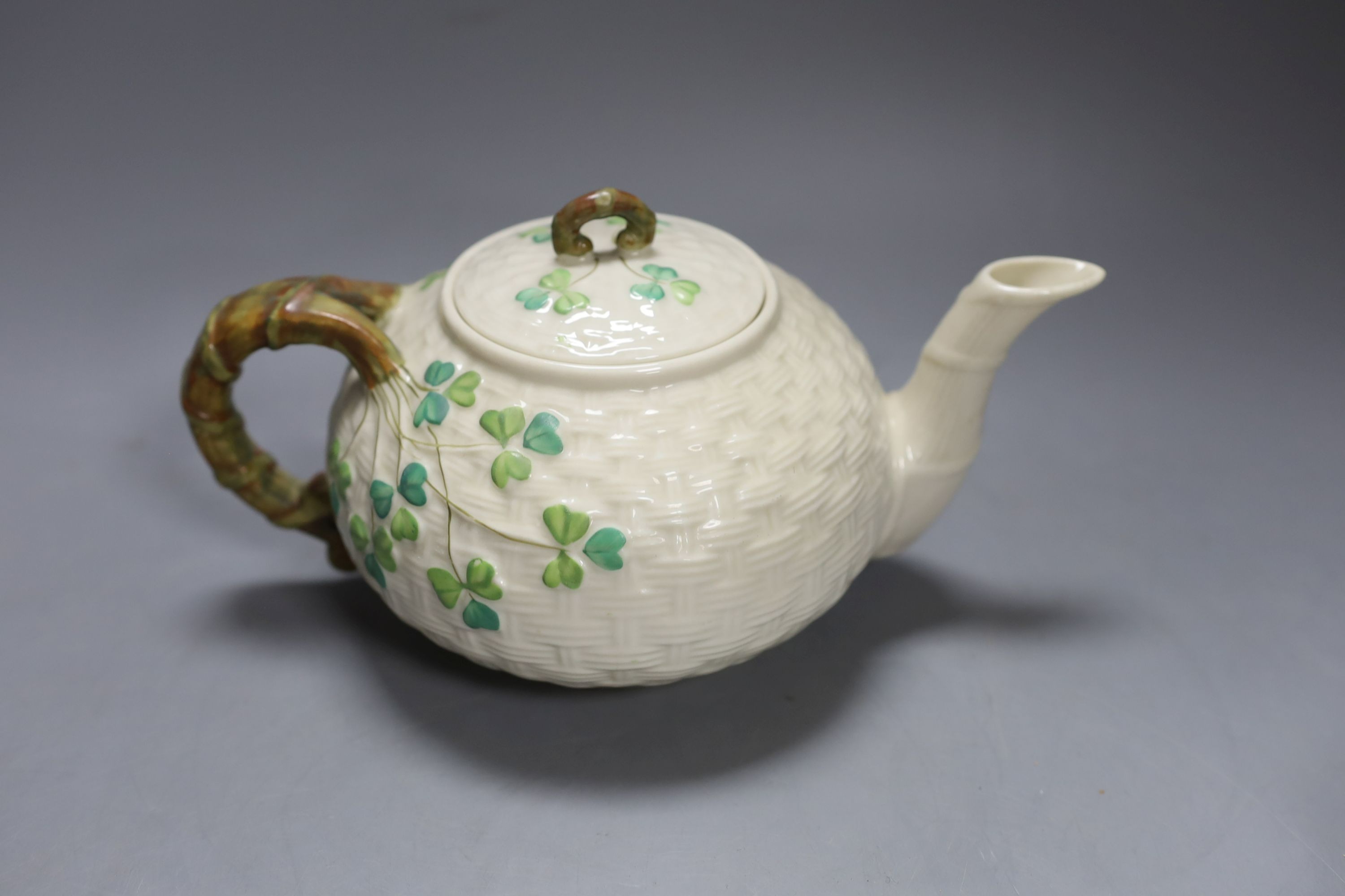 Matching Belleek sugar bowl milk jug and dish together with another Baleek cup and saucer and teapot (6)